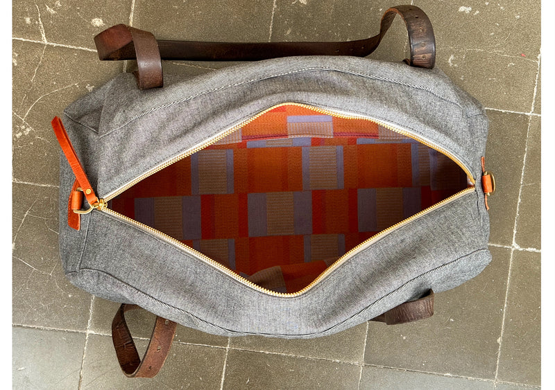 DEIA DUFFLE Bespoke, One-Of-A-Kind, Charcoal Cashmere Tweed  Lined With Blue & Burnt Orange Herringbone Weave